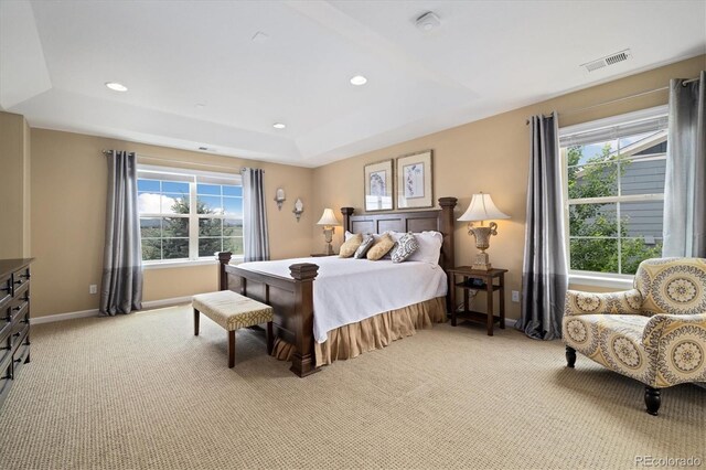17452 W 83rd Pl, Arvada, CO 80007 - bedroom with light colored carpet, multiple windows, baseboards, and recessed lighting