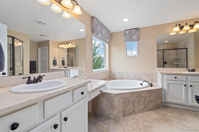 17452 W 83rd Pl, Arvada, CO 80007 - bathroom with a shower stall, a bath, two vanities, and recessed lighting