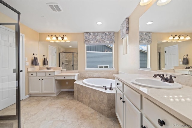 17452 W 83rd Pl, Arvada, CO 80007 - bathroom with a stall shower, a bath, and two vanities