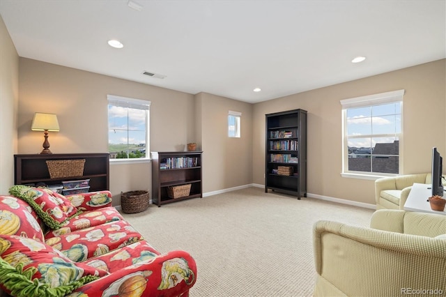17452 W 83rd Pl, Arvada, CO 80007 - living room with light colored carpet, baseboards, and recessed lighting