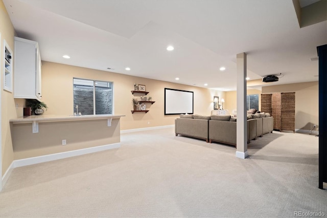 17452 W 83rd Pl, Arvada, CO 80007 - living room featuring light carpet, recessed lighting, and baseboards