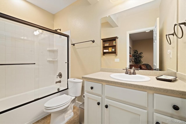 17452 W 83rd Pl, Arvada, CO 80007 - full bathroom with toilet, vanity, bath / shower combo with glass door, and tile patterned floors