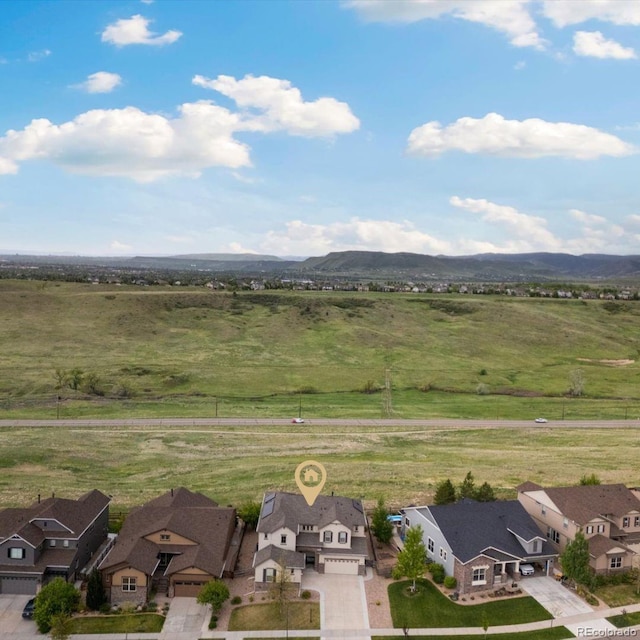17452 W 83rd Pl, Arvada, CO 80007 - aerial view of sparsely populated area with mountains and nearby suburban area