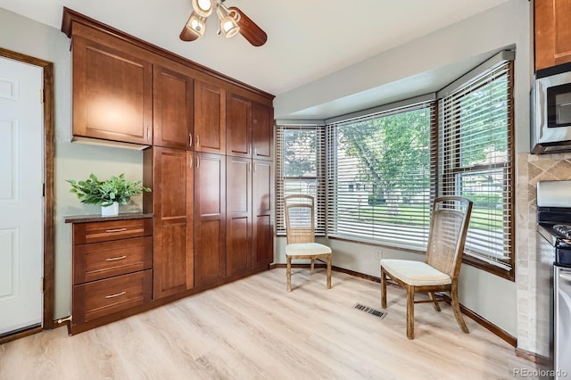 2299 Ranch Dr, Westminster, CO 80234 - sitting room featuring light wood-style flooring, baseboards, and ceiling fan