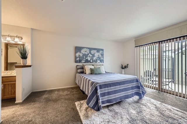 2299 Ranch Dr, Westminster, CO 80234 - bedroom with carpet, a sink, ensuite bath, and baseboards
