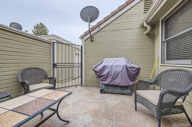 2299 Ranch Dr, Westminster, CO 80234 - view of patio featuring a grill