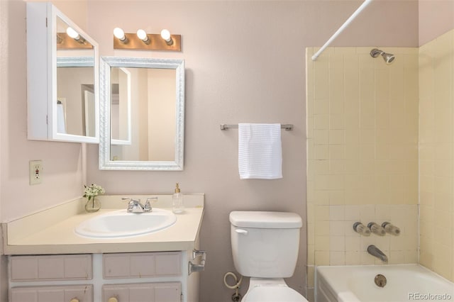 bathroom with toilet, bathing tub / shower combination, and vanity