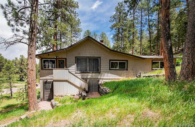 28958 Buffalo Park Rd, Evergreen, CO 80439 - view of front facade featuring stairs