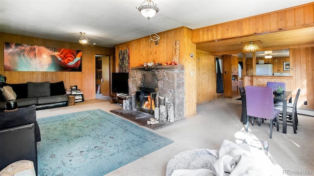 28958 Buffalo Park Rd, Evergreen, CO 80439 - living area featuring wooden walls and a fireplace