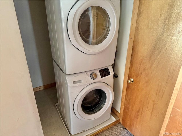 28958 Buffalo Park Rd, Evergreen, CO 80439 - laundry area with stacked washing machine and dryer