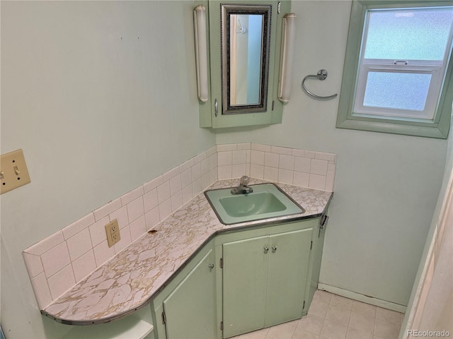 28958 Buffalo Park Rd, Evergreen, CO 80439 - bathroom with vanity, backsplash, and tile patterned floors