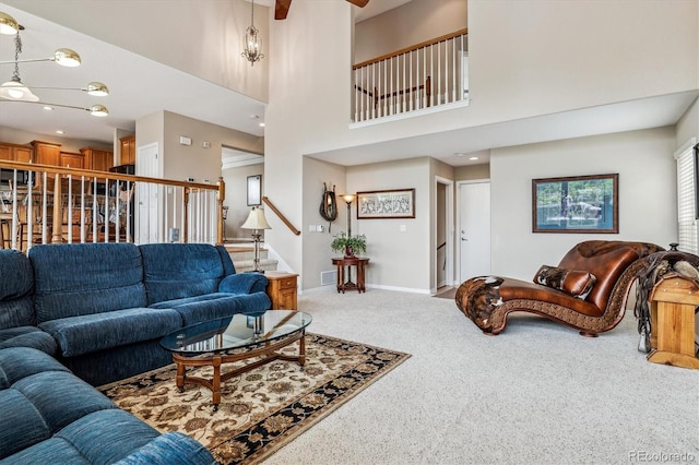 26155 E Euclid Dr, Aurora, CO 80016 - carpeted living area with stairway and a high ceiling