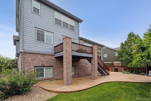 26155 E Euclid Dr, Aurora, CO 80016 - back of house with a patio area, brick siding, and stairs