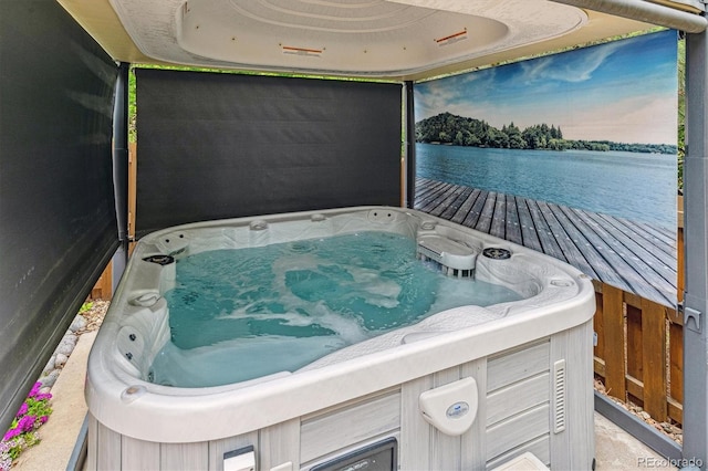 26155 E Euclid Dr, Aurora, CO 80016 - view of patio with a hot tub and a water view