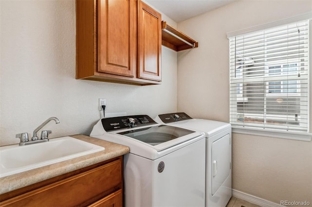 26155 E Euclid Dr, Aurora, CO 80016 - laundry area featuring independent washer and dryer and cabinet space