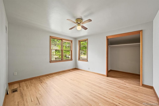 5355 S Windermere St, Littleton, CO 80120 - unfurnished bedroom featuring wood finished floors, a closet, baseboards, and ceiling fan