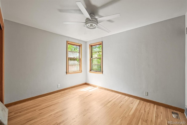 5355 S Windermere St, Littleton, CO 80120 - empty room featuring wood finished floors, a ceiling fan, and baseboards