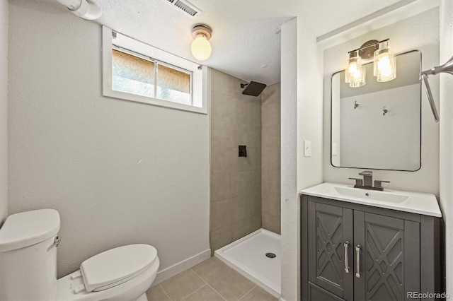 5355 S Windermere St, Littleton, CO 80120 - full bath with toilet, tiled shower, tile patterned flooring, and vanity