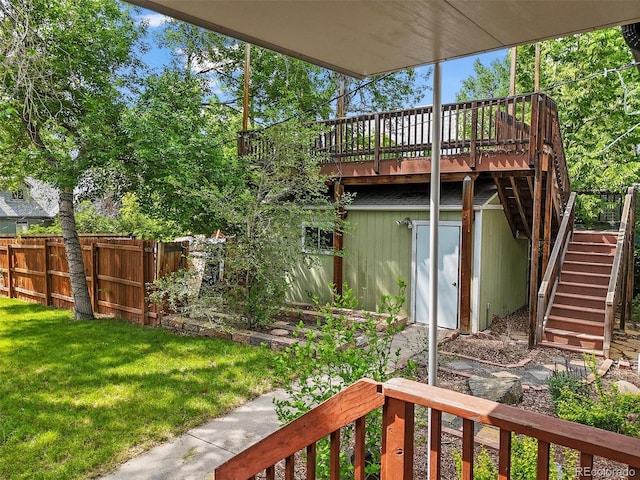 5355 S Windermere St, Littleton, CO 80120 - view of yard with stairs, a deck, and an outbuilding