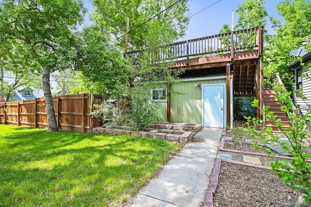5355 S Windermere St, Littleton, CO 80120 - rear view of house with a deck, a garden, and stairway