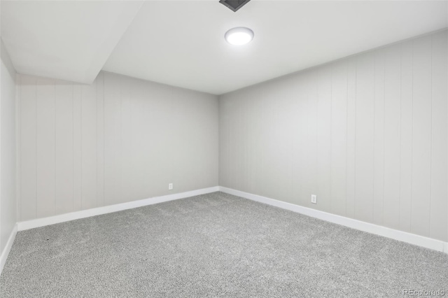 unfurnished room with carpet floors