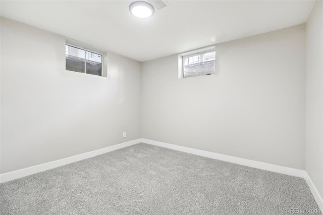 basement featuring plenty of natural light and carpet floors