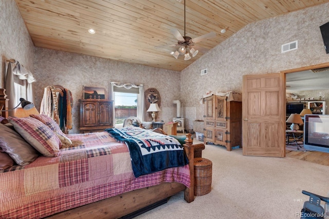 bedroom with wood ceiling, high vaulted ceiling, ceiling fan, and light colored carpet