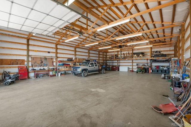 garage with a workshop area