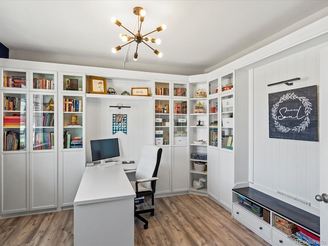 2853 Black Canyon Way, Castle Rock, CO 80109 - office with light wood-style floors and an inviting chandelier
