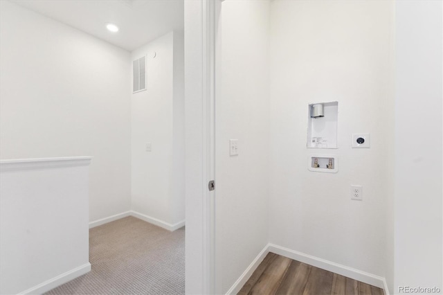 laundry area with hookup for a washing machine, visible vents, baseboards, and electric dryer hookup