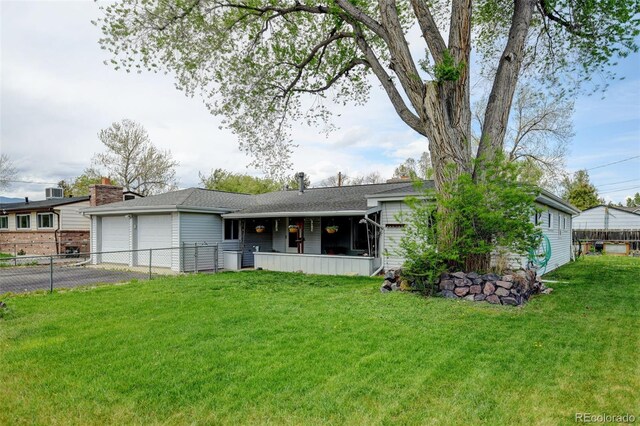 single story home with an attached garage, asphalt driveway, a shingled roof, and covered porch