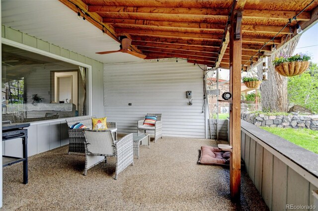 view of patio featuring a ceiling fan