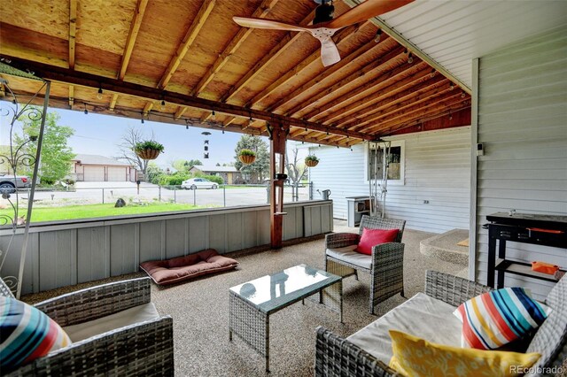 view of patio / terrace featuring an outdoor hangout area, ceiling fan, and fence