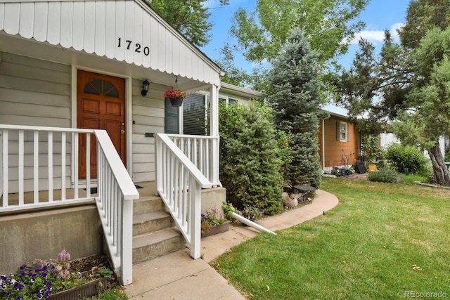 1720 S Madison St, Denver, CO 80210 - property entrance with a yard