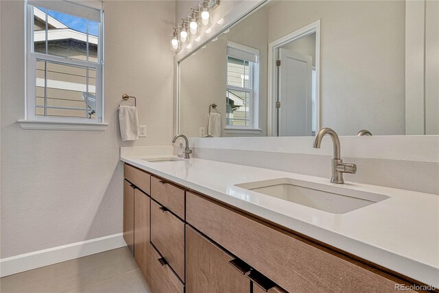 5251 Silver Hare Ct, Castle Rock, CO 80104 - full bathroom featuring a sink, baseboards, tile patterned floors, and double vanity