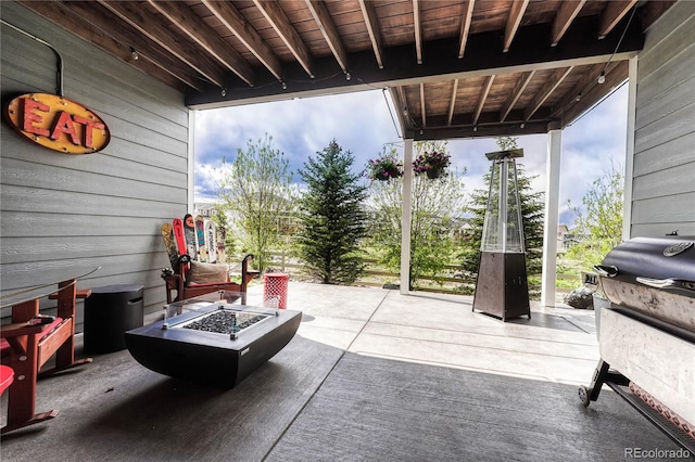 5251 Silver Hare Ct, Castle Rock, CO 80104 - view of patio / terrace with an outdoor fire pit and area for grilling