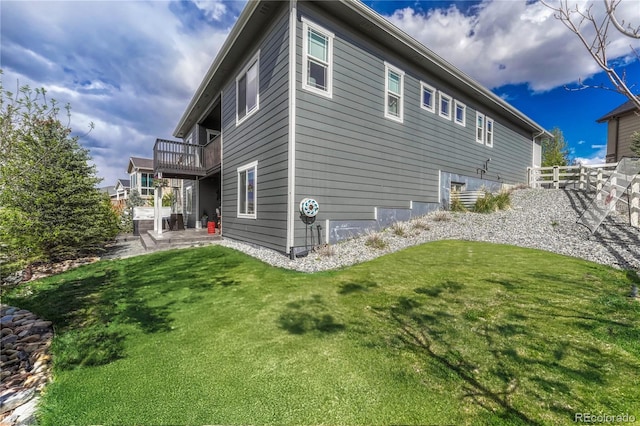 5251 Silver Hare Ct, Castle Rock, CO 80104 - view of side of home with a lawn and a patio