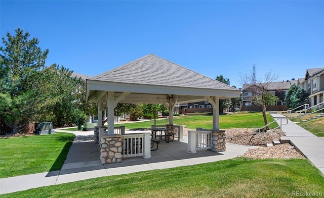 14700 E 104th Ave Unit 1105, Commerce City, CO 80022 - surrounding community with a gazebo and a yard