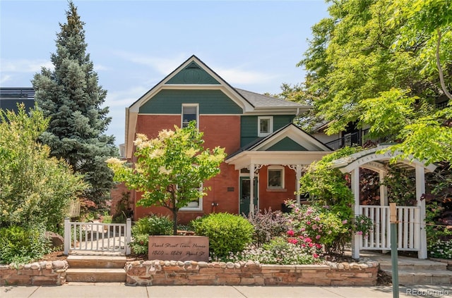 1824 Pearl St Unit B, Boulder, CO 80302 - view of front of house featuring brick siding