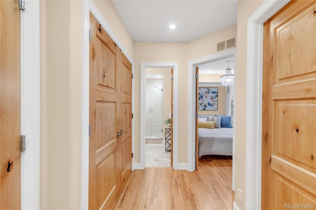 1824 Pearl St Unit B, Boulder, CO 80302 - hallway with light wood-style flooring and baseboards
