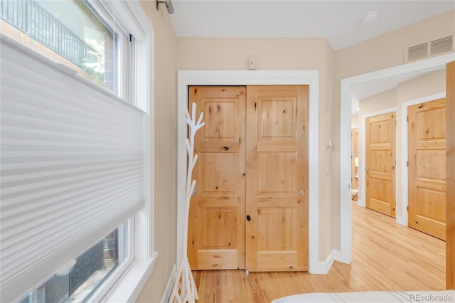 1824 Pearl St Unit B, Boulder, CO 80302 - hall with light wood-style flooring and baseboards