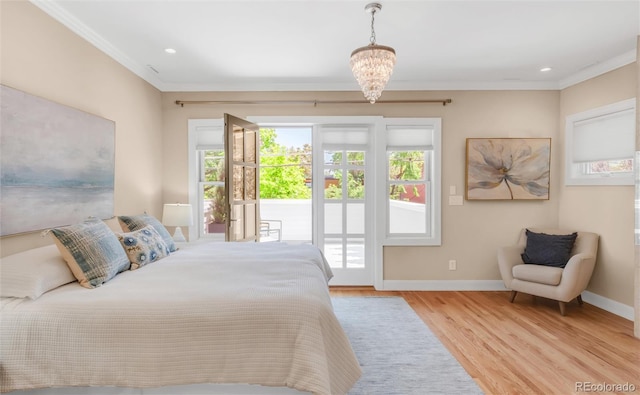 1824 Pearl St Unit B, Boulder, CO 80302 - bedroom featuring access to outside, wood finished floors, crown molding, a chandelier, and recessed lighting
