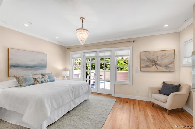 1824 Pearl St Unit B, Boulder, CO 80302 - bedroom with access to exterior, light wood finished floors, ornamental molding, recessed lighting, and a chandelier