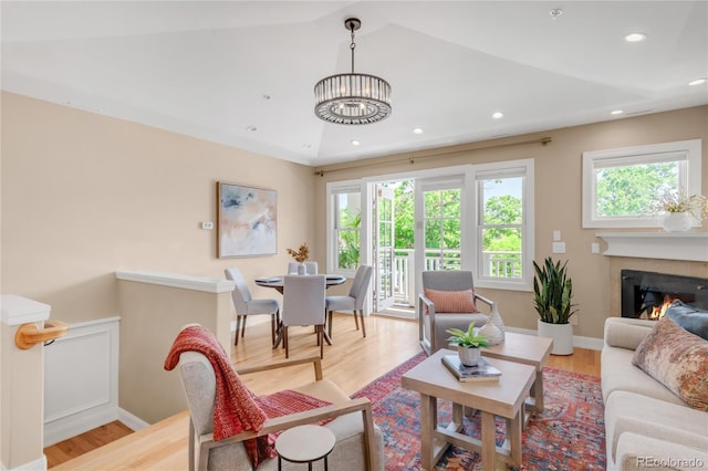 1824 Pearl St Unit B, Boulder, CO 80302 - living area featuring plenty of natural light, light wood-style floors, a chandelier, and recessed lighting