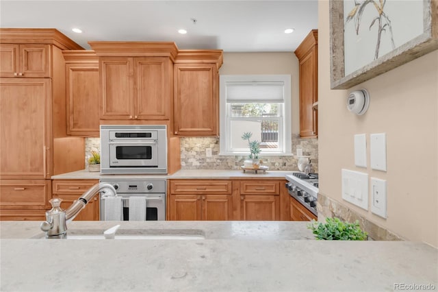 1824 Pearl St Unit B, Boulder, CO 80302 - kitchen featuring appliances with stainless steel finishes, backsplash, and recessed lighting