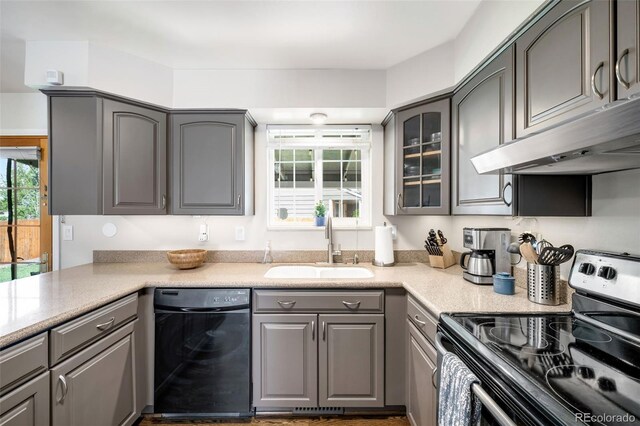 12945 E Colorado Ave, Aurora, CO 80012 - kitchen featuring a sink, gray cabinets, under cabinet range hood, and stainless steel electric range