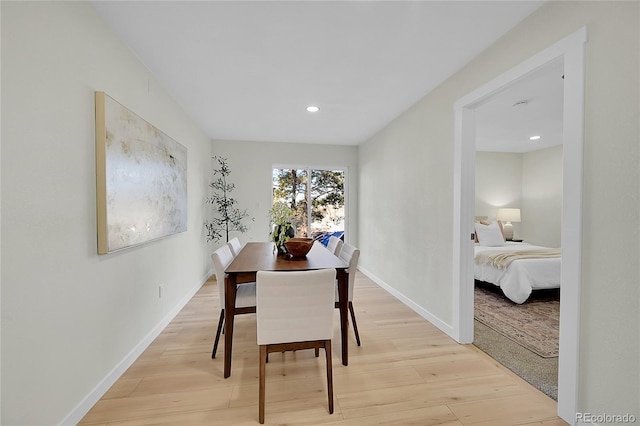 dining area with light wood-type flooring