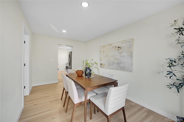 dining room featuring light hardwood / wood-style floors