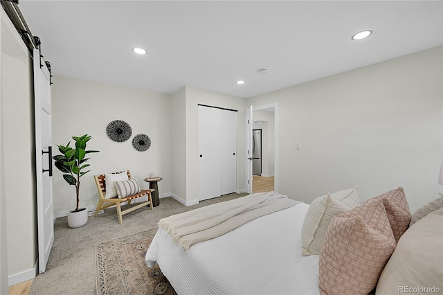 bedroom with a barn door