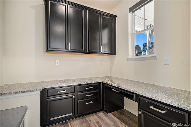 washroom with dark hardwood / wood-style flooring